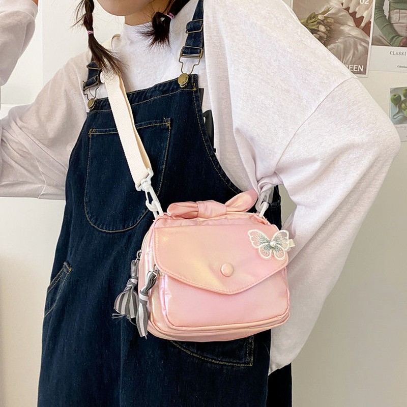 MBTI كاندي اللون الإناث حقيبة كتف موضة 2022 الليزر Crossbody حقيبة ساعي اليابانية Kawaii الطلاب الدانتيل فراشة أكياس