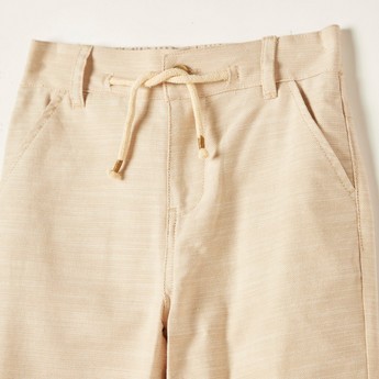 Solid Woven Pants with Pocket Detail and Button Closure