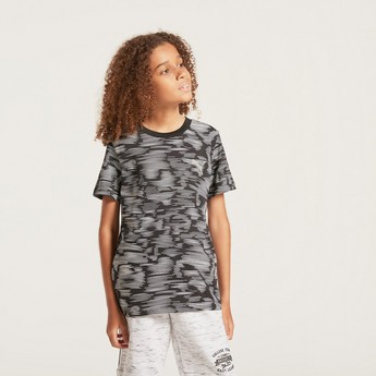 PUMA All-Over Printed T-shirt with Short Sleeves