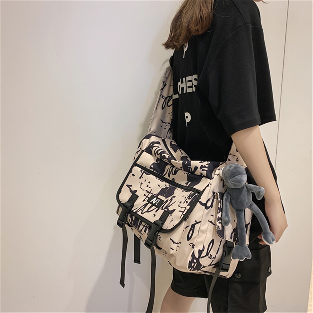 Cute Pendant Design High Quality Nylon Ladies Fashion Shoulder Bag Paneled New Design Women Student Bags 2022 New Messenger Bag