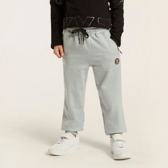 XYZ Textured Pants with Drawstring Closure and Zipper Pockets