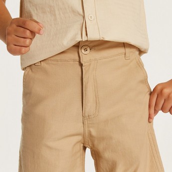 Juniors Solid Mid-Rise Shorts with Pockets and Button Closure