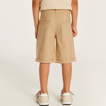 Juniors Solid Mid-Rise Shorts with Pockets and Button Closure