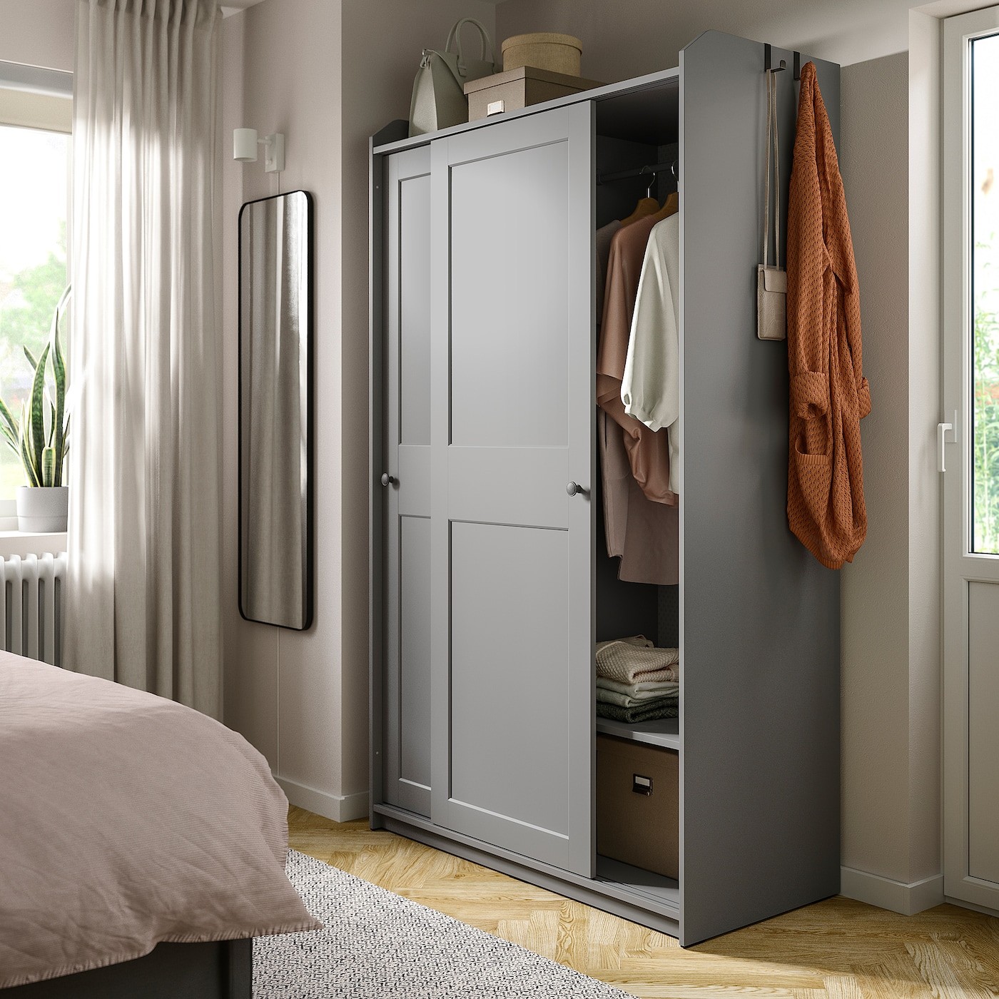 HAUGA Wardrobe with sliding doors