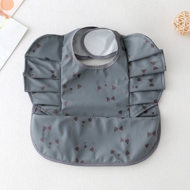 Waterproof Baby Food Eating Baby Bibs PU Cartoon Smock For Babies Feeding Clothes Sleeveless Bib With Pocket Newborn Baby Bib