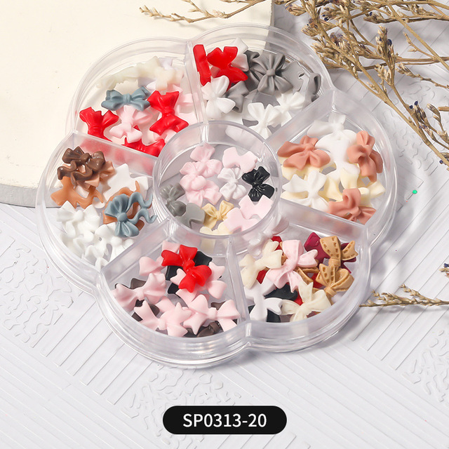 1 Box of 7 Nail Art Decorations Bow Aurora Bear Butterfly Rhinestone Pearl Mixed Set Box DIY Nail Decoration designer charms