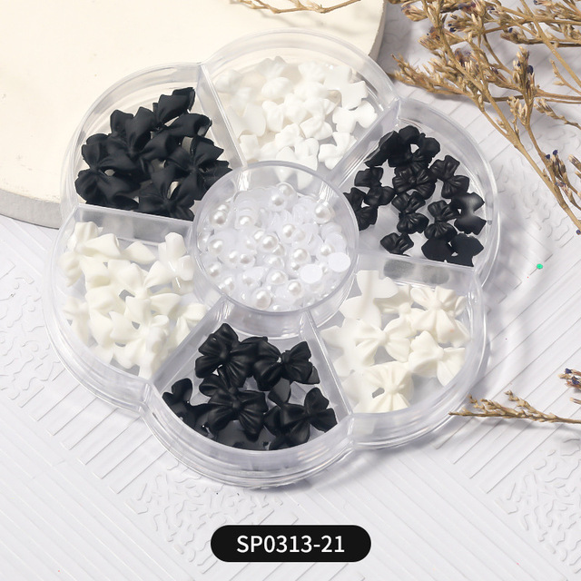 1 Box of 7 Nail Art Decorations Bow Aurora Bear Butterfly Rhinestone Pearl Mixed Set Box DIY Nail Decoration designer charms