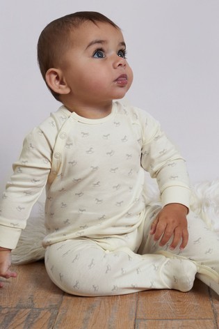 The Little Tailor Cream Jersey Print Rocking Horse Sleepsuit