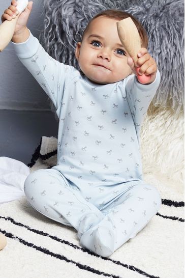 The Little Tailor Blue Jersey Print Rocking Horse Sleepsuit