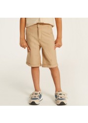 Juniors Solid Mid-Rise Shorts with Pockets and Button Closure