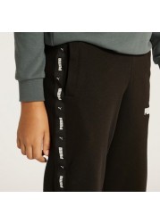 PUMA Solid Joggers with Elasticated Waistband and Tape Detail