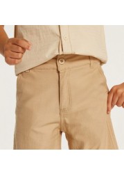 Juniors Solid Mid-Rise Shorts with Pockets and Button Closure