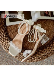 Mid-heel pearl strap sandals women's thick heel 2022 summer transparent one word with crystal high heels