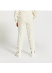 PUMA Logo Detail Joggers with Drawstring Closure and Pockets