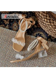 Mid-heel pearl strap sandals women's thick heel 2022 summer transparent one word with crystal high heels